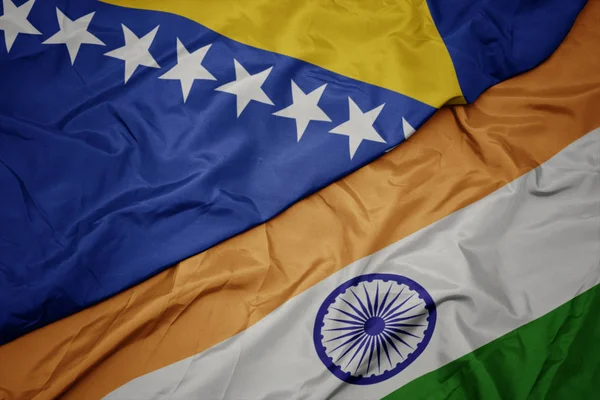 Waving colorful flag of india and national flag of bosnia and herzegovina. — Stock Photo, Image