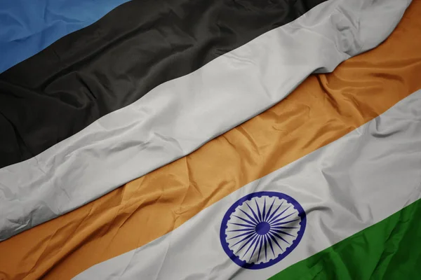Waving colorful flag of india and national flag of estonia. — Stock Photo, Image