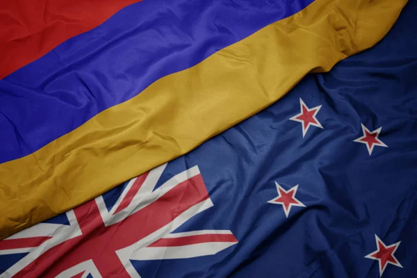 Waving colorful flag of new zealand and national flag of armenia. — Stock Photo, Image