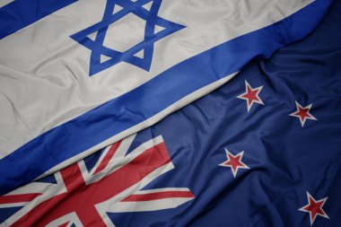 Yeni Zelanda ve İsrail ulusal bayrağı renkli bayrak sallayarak.