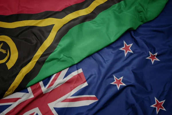 Waving colorful flag of new zealand and national flag of Vanuatu. — Stock Photo, Image