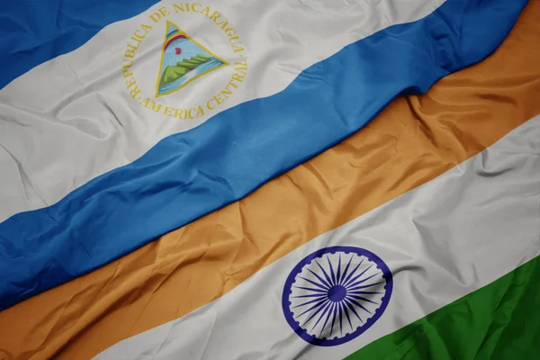Az indiai zászló színpompás zászlója és a nicaraguai nemzeti zászló. — Stock Fotó