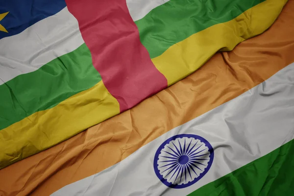 waving colorful flag of india and national flag of central african republic.