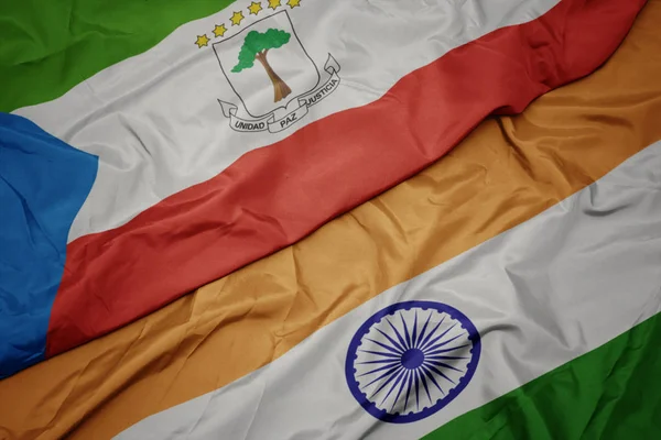 Ondeando colorida bandera de la India y bandera nacional de Guinea Ecuatorial . —  Fotos de Stock