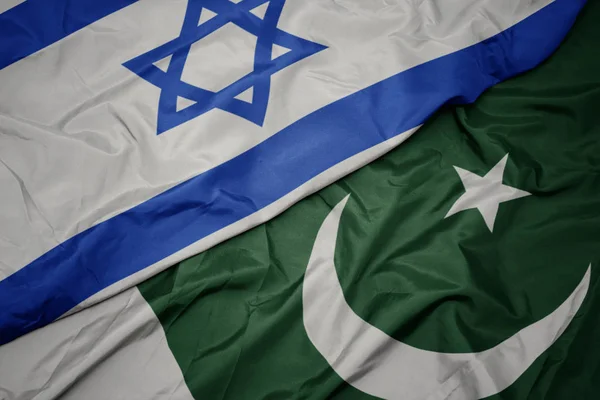 Waving colorful flag of pakistan and national flag of israel. — Stock Photo, Image