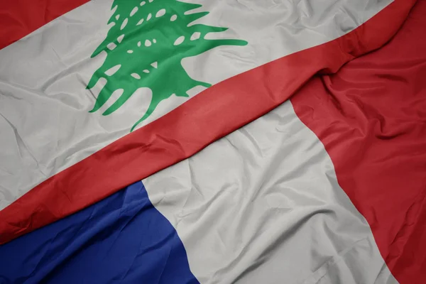 Waving colorful flag of france and national flag of lebanon. — Stock Photo, Image