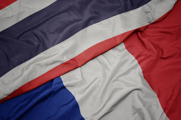 Waving colorful flag of france and national flag of thailand. — Stock Photo, Image