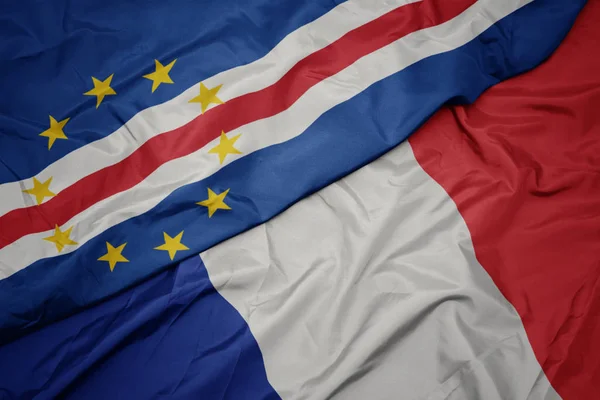 Waving colorful flag of france and national flag of cape verde. — Stock Photo, Image