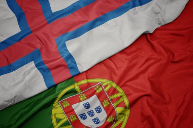 portekiz ve faroe adaların ulusal bayrak renkli bayrak sallayarak.