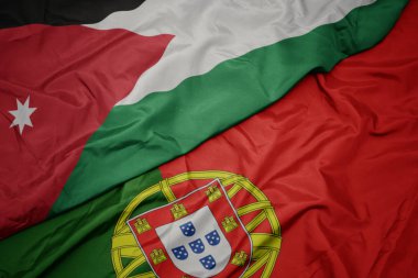 portekiz ve ürdün ulusal bayrağı renkli bayrak sallayarak.