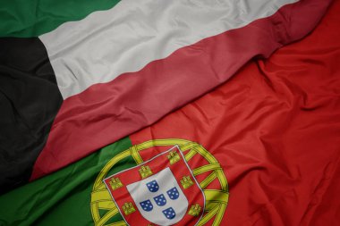 portekiz ve kuveyt ulusal bayrağı renkli bayrak sallayarak.