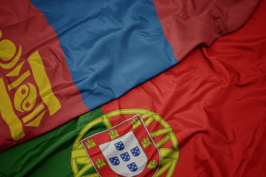 portekiz ve moğolistan ulusal bayrağı renkli bayrak sallayarak.