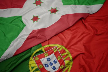 portekiz ve burundi ulusal bayrağı renkli bayrak sallayarak.
