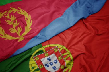 portekiz ve eritre ulusal bayrağı renkli bayrak sallayarak