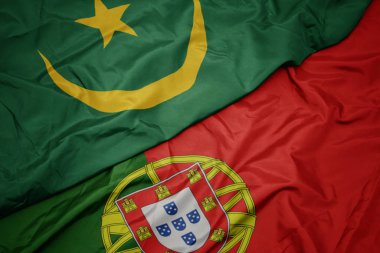 portekiz ve moritanya ulusal bayrağı renkli bayrak sallayarak.