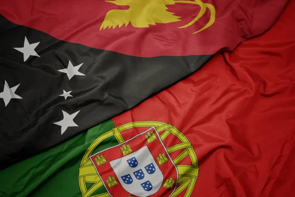 Portekiz ve Papua Yeni Gine ulusal bayrağı renkli bayrak sallayarak , .