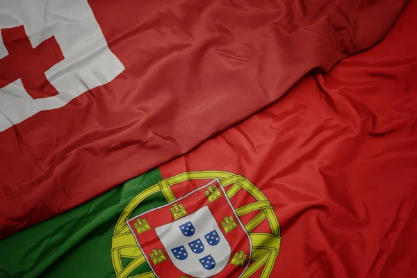 Portekiz ve Tonga ulusal bayrağı renkli bayrak sallayarak , .