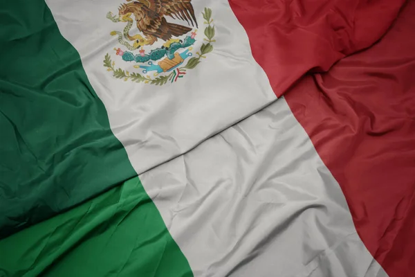 Waving colorful flag of italy and national flag of mexico. — Stock Photo, Image