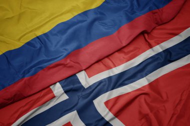 norveç ve kolombiya ulusal bayrağı renkli bayrak sallayarak.