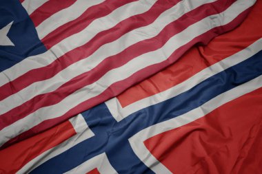 norveç ve liberya ulusal bayrağı renkli bayrak sallayarak.