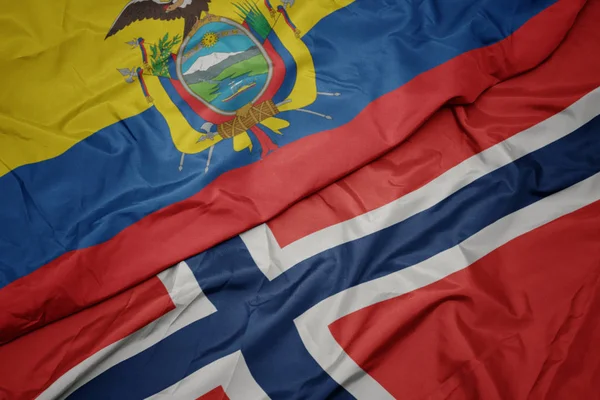 Ondeando colorida bandera de norway y bandera nacional de ecuador . —  Fotos de Stock