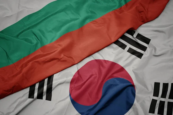 Waving colorful flag of south korea and national flag of bulgaria. — Stock Photo, Image