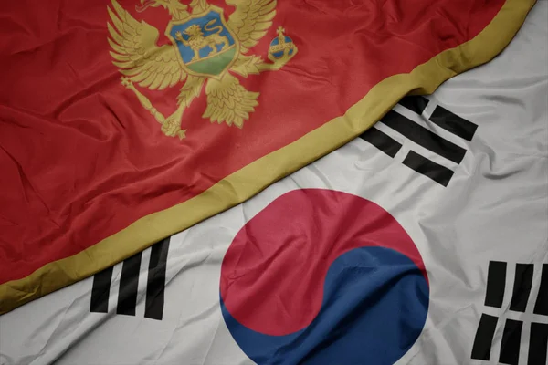 Waving colorful flag of south korea and national flag of montenegro. — Stock Photo, Image