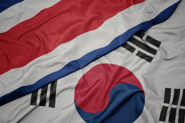 Waving colorful flag of south korea and national flag of costa rica. — Stock Photo, Image