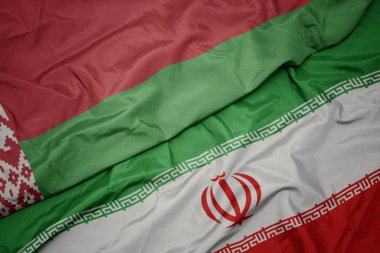 İran ve belarus ulusal bayrağı renkli bayrak sallayarak.