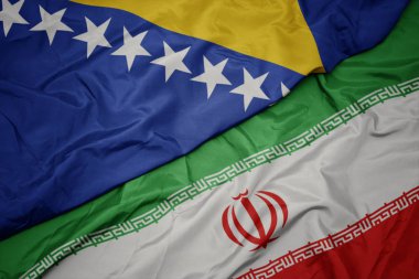 İran ve bosna-hersek ulusal bayrağı renkli bayrak sallayarak.