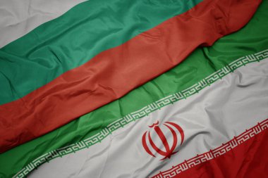 İran ve bulgaristan ulusal bayrağı renkli bayrak sallayarak.