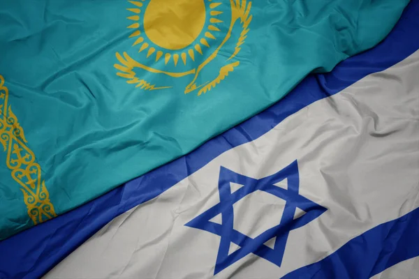 İsrail ve Kazakistan ulusal bayrağı renkli bayrak sallayarak. — Stok fotoğraf