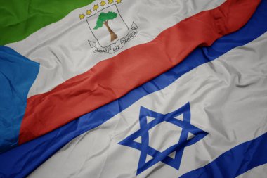 İsrail ve ekvator ginesi ulusal bayrağı renkli bayrak sallayarak.