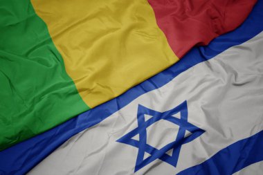 İsrail ve mali ulusal bayrak renkli bayrak sallayarak.