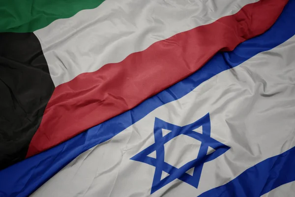 이스라엘의 화려한 국기와 쿠웨이트의 국기를 흔들. — 스톡 사진