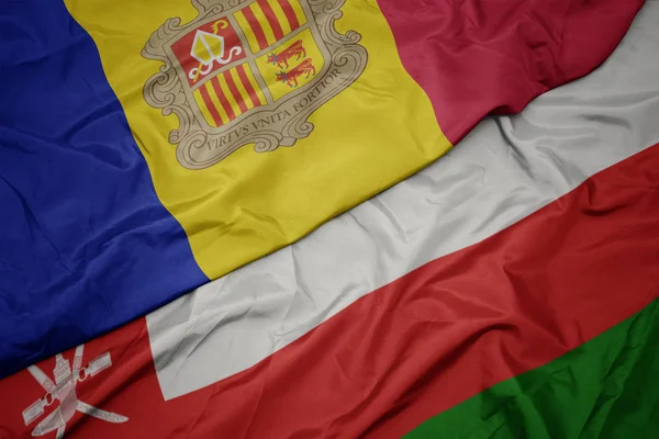 Vifta färgglada flagga Oman och nationella flaggan i Andorra. — Stockfoto