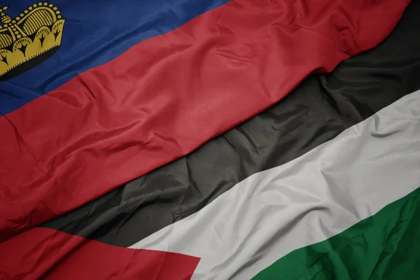 Waving colorful flag of palestine and national flag of liechtenstein. — Stock Photo, Image