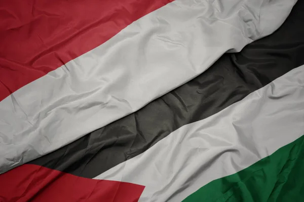 A Palesztina és Indonézia nemzeti zászlója színpompás zászlaját. — Stock Fotó