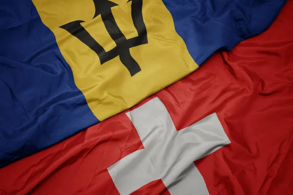 Macha kolorowy flaga Szwajcarii i flagi narodowej Barbados. — Zdjęcie stockowe