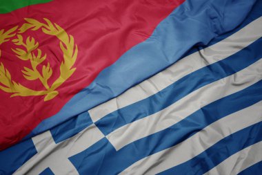 yunanistan ve eritre ulusal bayrağı renkli bayrak sallayarak.