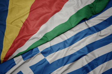 yunanistan ve seyşeller ulusal bayrağı renkli bayrak sallayarak.