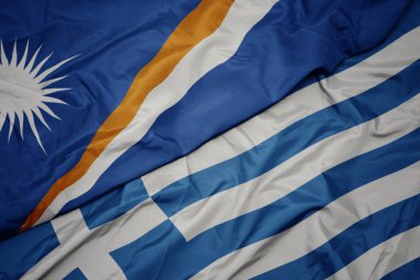 Yunanistan ve Marshall Adaları ulusal bayrağı renkli bayrak sallayarak .