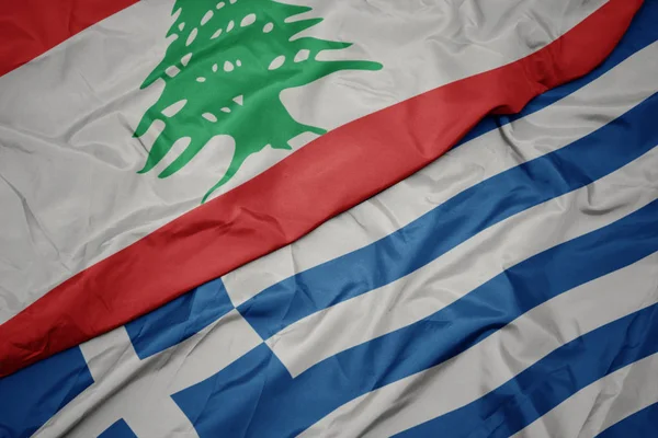 yunanistan ve lübnan ulusal bayrağı renkli bayrak sallayarak.
