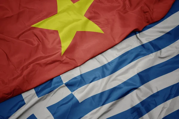 Waving colorful flag of greece and national flag of vietnam. — Stock Photo, Image