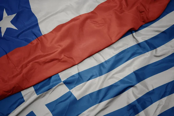 Waving colorful flag of greece and national flag of chile. — Stock Photo, Image