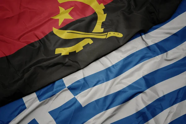 Acenando bandeira colorida da grécia e bandeira nacional de angola . — Fotografia de Stock