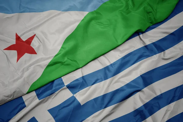 Acenando bandeira colorida da grécia e bandeira nacional do djibuti . — Fotografia de Stock