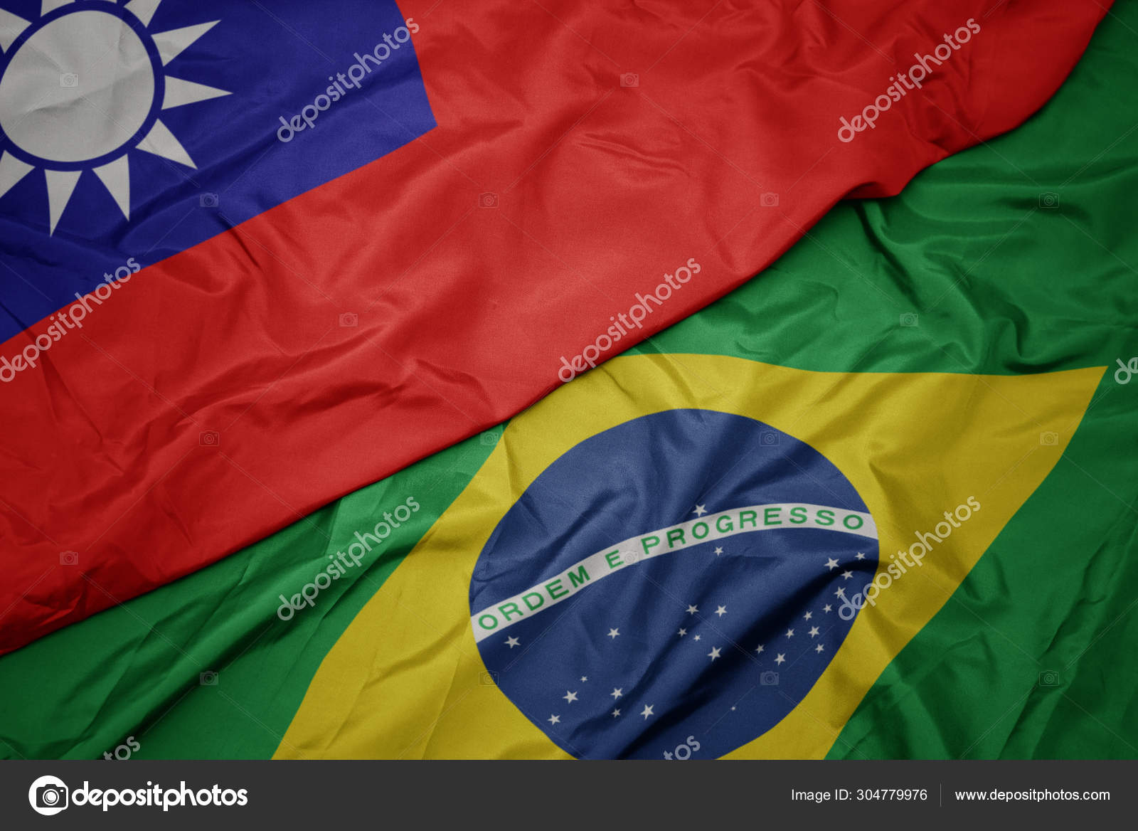 挥舞着五颜六色的巴西国旗和台湾国旗 图库照片 C Ruletkka