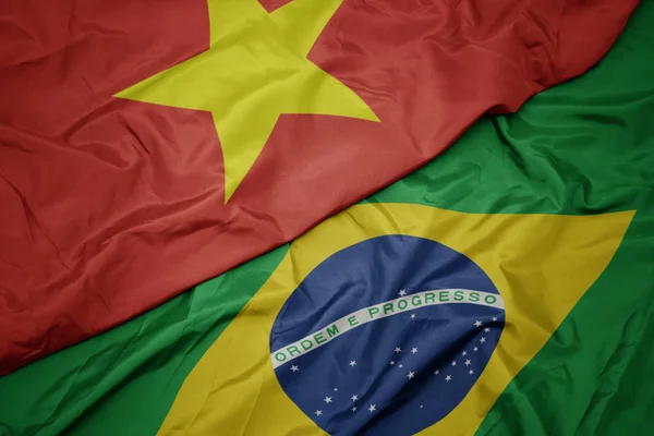 Waving colorful flag of brazil and national flag of vietnam. — Stock Photo, Image