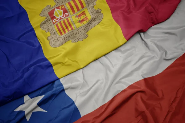 Waving colorful flag of chile and national flag of andorra. — Stock Photo, Image